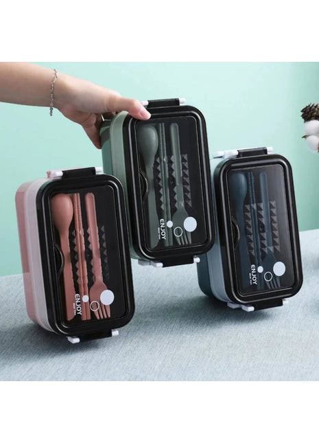  A stainless steel Bento lunch box with internal dividers and a built-in utensil compartment, perfect for organized meals.