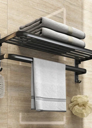 Maximize your bathroom storage with this sleek black towel rack that offers space for multiple towels.