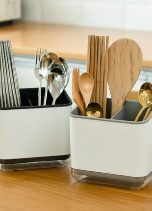 Efficiently dries cutlery with a smart, multi-compartment design and a water-collecting tray.