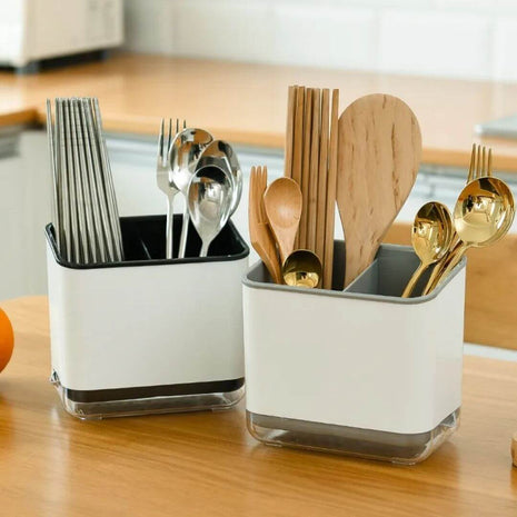 Efficiently dries cutlery with a smart, multi-compartment design and a water-collecting tray.