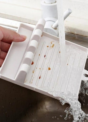 Keeps utensils and lids within reach.