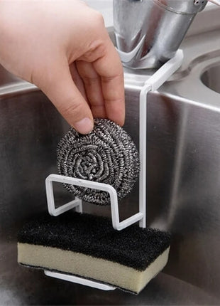 Features drainage holes for quick drying of sponges and brushes