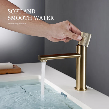 Enhance your kitchen with this luxurious brushed gold faucet. Features a sleek, modern design perfect for any stylish kitchen.