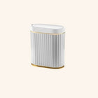  Enhance your space with this elegant trash can featuring a sophisticated gold trim.