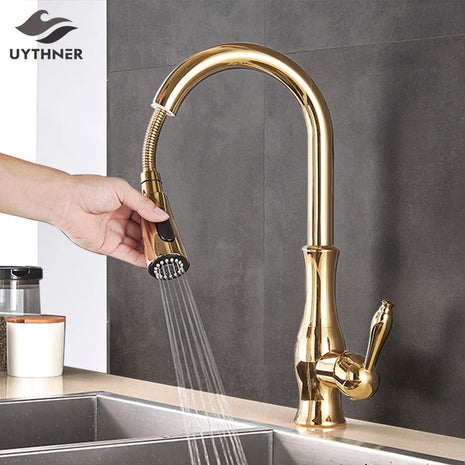 Add a touch of luxury to your kitchen with this gold polished faucet featuring a flexible pull-down spout.

