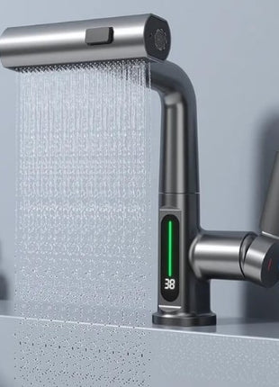 Sleek and stylish, the "Almog" waterfall kitchen faucet with a digital temperature display adds a touch of modern luxury to any kitchen