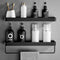 A sleek and modern black shelf for your bathroom.