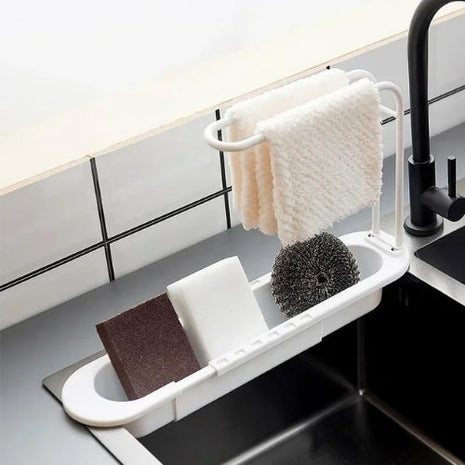 A sturdy plastic sponge holder that keeps your kitchen sink organized and dry.

