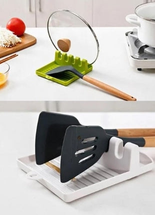 Holds spatulas, forks, and pot lids during cooking.