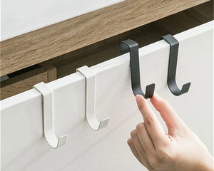 This multifunctional cabinet door hook features a sleek S-shaped design, ideal for organizing and hanging various items in your kitchen, bathroom, or office.

