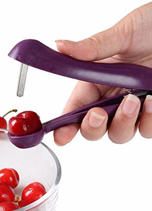 A cherry pitter that looks like a stapler but efficiently removes the pit without damaging the cherry.
