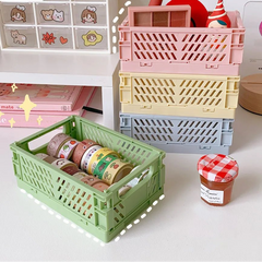Durable and space-saving, this white foldable plastic storage box is perfect for organizing toys, vegetables, fruits, letters, and office supplies. #StorageSolution #WhiteStorageBox