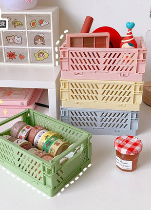 Durable and space-saving, this white foldable plastic storage box is perfect for organizing toys, vegetables, fruits, letters, and office supplies. #StorageSolution #WhiteStorageBox