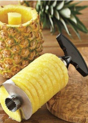  Effortlessly slice pineapples into perfect rings with this durable stainless steel cutter